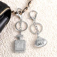 Modern Style Simple Style Shell Alloy Plating Inlay Rhinestones 18K Gold Plated Bag Pendant Keychain main image 1